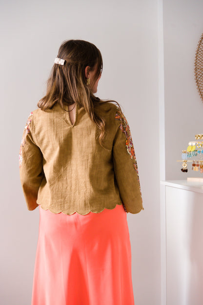 Cognac blouse with orange detailed sleeves